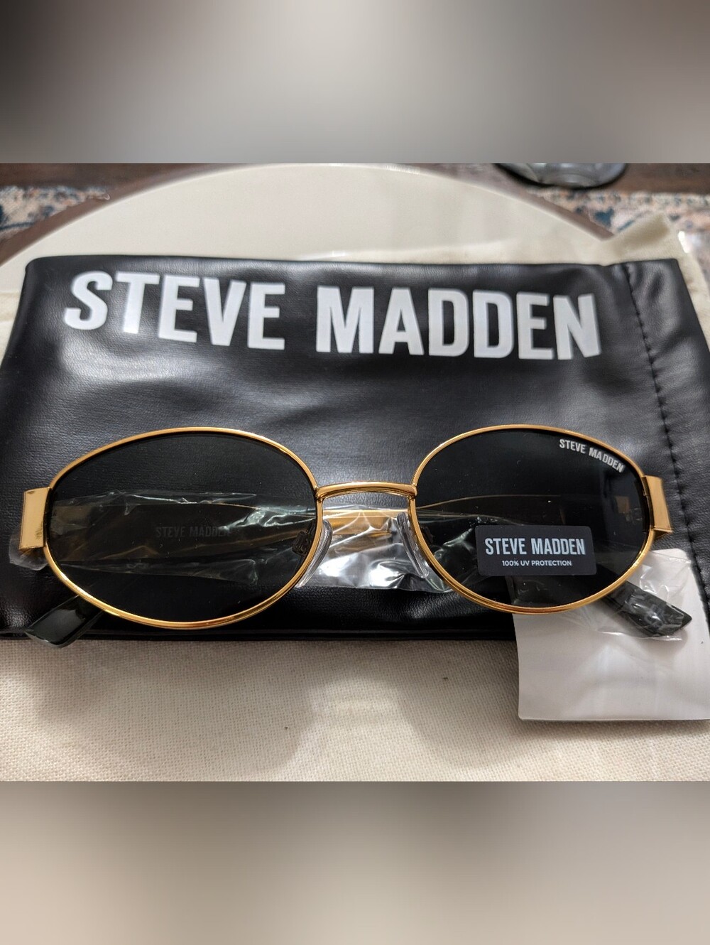 Steve Madden Gold Oval Sunglasses with Black Lenses